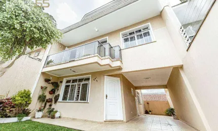 Sobrado com 4 dormitórios à venda, 166 m² por R$ 970.000,00 - Xaxim - Curitiba/PR