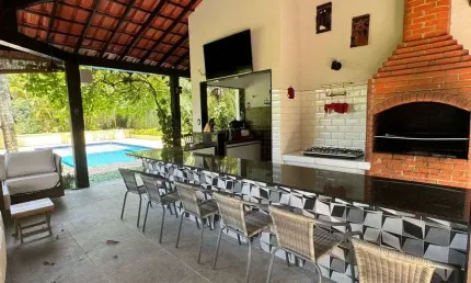 Casa de condomínio para venda com 697 metros quadrados com 5 quartos