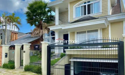 Sobrado com 4 dormitórios à venda, 430 m² por R$ 2.200.000 - Jardim do Lago - Canoas/RS