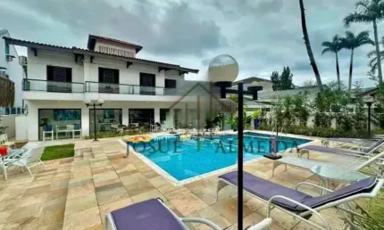 Casa em condomínio fechado com 5 quartos à venda na Rua Ezio Renato João Mora, 151, Jardim Acapulco, Guarujá
