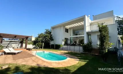 Casa 6 dormitórios sendo 5 suítes em condomínio fechado, cacupé - florianópolis/sc.
