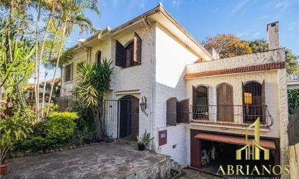 Casa com 5 quartos à venda na rua professor ivo corseuil, 129, petrópolis, porto alegre por r$ 1.350.000