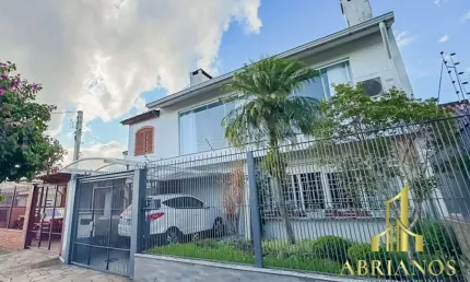 Casa com 4 quartos à venda na rua pedro waine, 194, santa maria goretti, porto alegre por r$ 835.000