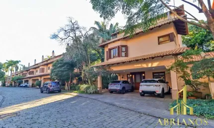 Casa em condomínio fechado com 4 quartos à venda na avenida otto niemeyer, 77, tristeza, porto alegre por r$ 1.990.000