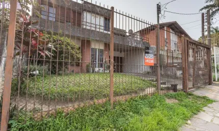 Casa com 4 quartos à venda na rua tupã, 88, vila assunção, porto alegre por r$ 850.000