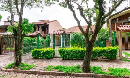 Casa com 3 quartos à venda na rua jaguari, 878, cristal, porto alegre por r$ 879.000
