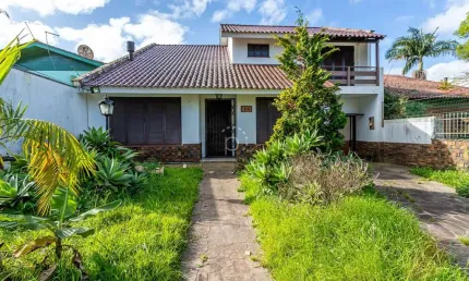 Casa com 3 quartos à venda na rua mura, 60, guarujá, porto alegre por r$ 600.000