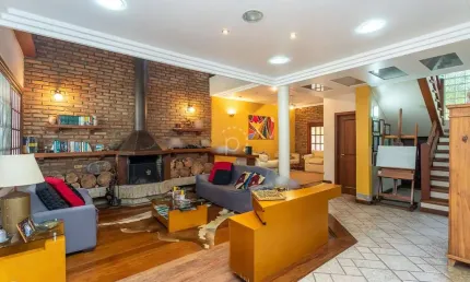 Casa com 3 quartos à venda na avenida orleaes, 492, guarujá, porto alegre por r$ 1.980.000