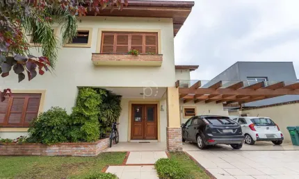 Casa em condomínio fechado com 5 quartos à venda na avenida juca batista, 8000, belém novo, porto alegre por r$ 3.450.000