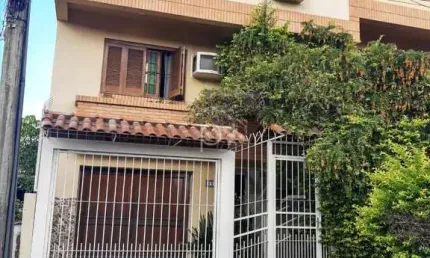 Casa com 3 quartos à venda na rua professor joaquim louzada, 98, camaquã, porto alegre por r$ 520.000