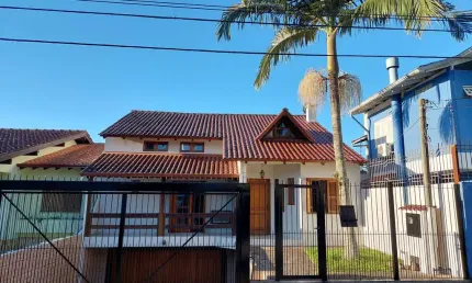 Casa com 3 quartos à venda na rua professor leonardo tochtrop, 19, ipanema, porto alegre por r$ 1.200.000