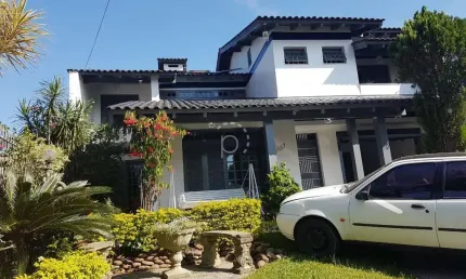 Casa com 4 quartos à venda na rua doutor mário totta, 2087, tristeza, porto alegre por r$ 1.680.000