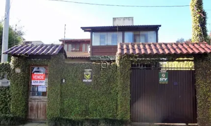 Casa com 3 quartos à venda na avenida guarujá, 140, guarujá, porto alegre por r$ 750.000
