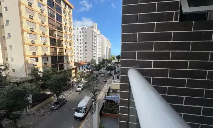 2 dormitórios sendo 2 suítes,e 1 lavabo/aparecida-santos /prédio novo com lazer completo