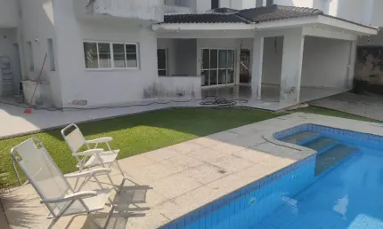 Casa com piscina e 4 suites a venda na praia do pernambuco guaruja sp