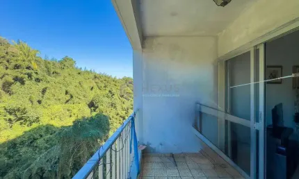 Apartamento com varanda na praia do tombo de 1 quarto com 1 vaga, guarujá-sp.