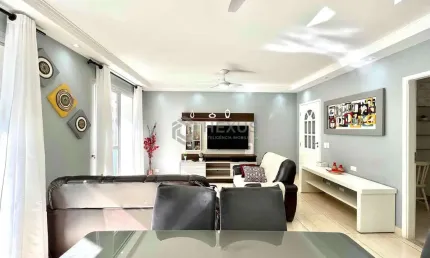 Apartamento com varanda a uma quadra da praia das pitangueiras, guarujá-sp.