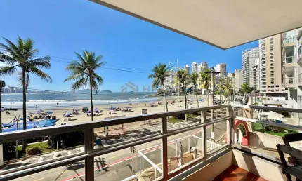Apartamento na praia das astúrias à venda com varanda e vista para o mar com 4 suítes e 2 vagas.