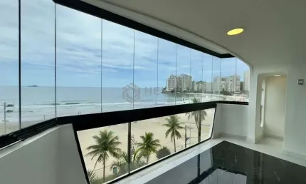 Apartamento à venda na praia das astúrias com varanda e vista para o mar com 3 quartos e 2 vagas.