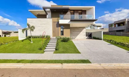 Alphaville jundiaí 1 - casa moderna à venda no alphaville jundiaí 1 com 4 suítes, piscina, área gourmet e energia solar