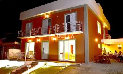 Casa ampla em condomínio fechado – 5 quartos, espaço gourmet e área de lazer completa