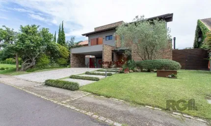 Casa em condomínio 4 dormitórios à venda belém novo porto alegre/rs