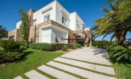 Casa em condomínio 4 dormitórios à venda belém novo porto alegre/rs