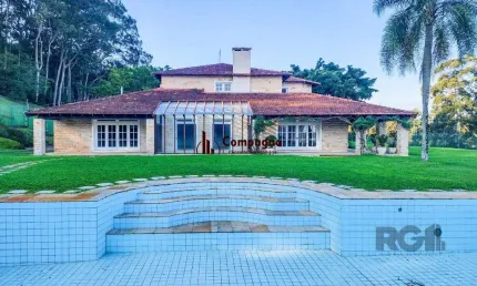 Casa em condomínio fechado com 5 quartos à venda na Estrada das Três Meninas, 1701, Vila Nova, Porto Alegre