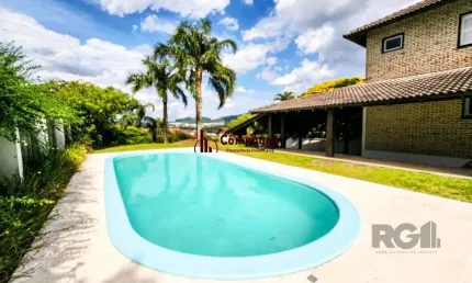 Casa em condomínio 5 dormitórios à venda cavalhada porto alegre/rs