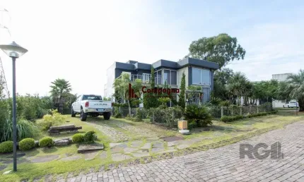 Casa em condomínio 4 dormitórios à venda vila nova porto alegre/rs