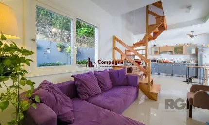 Living em dois ambientes com cozinha americana, lavabo, pátio, lavanderia. o3 do