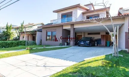 Casa em condomínio 4 dormitórios à venda belém novo porto alegre/rs