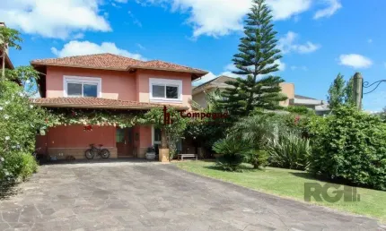 Casa em condomínio 4 dormitórios à venda belém novo porto alegre/rs