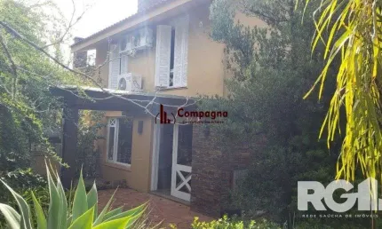 Casa em condomínio fechado com 3 quartos à venda na Rua Professor Carlos de Paula Couto, 500, Cavalhada, Porto Alegre