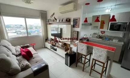 Apartamento de 2 dormitórios, suíte, churrasqueira e 2 vagas.