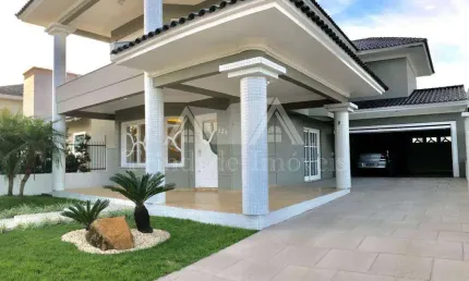 Casa com 3 quartos à venda na Rua Andira, 825, Centro, Capão da Canoa por R$ 1.980.000