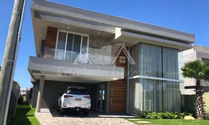 Casa em condomínio fechado com 5 quartos à venda na Avenida Paraguassu, 14, Capão Novo, Capão da Canoa por R$ 3.000.000
