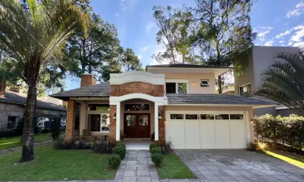 Casa em condomínio fechado com 4 quartos à venda na Avenida Central, Atlântida, Xangri-Lá por R$ 2.015.000