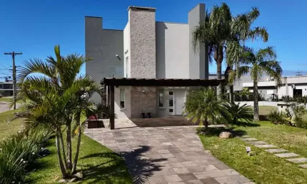 Casa em condomínio fechado com 3 quartos à venda na Rua Onório Germano, 2005, Zona Nova, Capão da Canoa por R$ 1.300.000