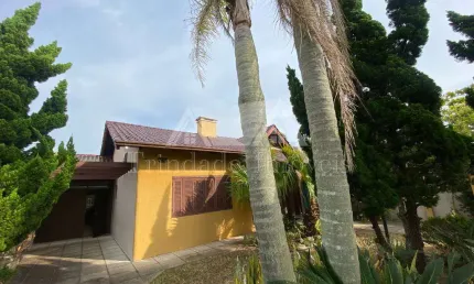 Casa com 3 quartos à venda na Rua Tupanciretã/Moacir, 3812, Guarani, Capão da Canoa por R$ 650.000