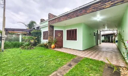 Casa com 3 quartos à venda na Rua Paulo Celestino Franco, Guarani, Capão da Canoa por R$ 680.000