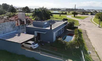 Casa com 3 quartos à venda na Rua Juriti, 970, Atlântida, Xangri-Lá por R$ 1.550.000