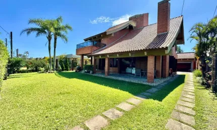 Casa com 5 quartos à venda na Rua Zabelê, 1012, Atlântida, Xangri-Lá por R$ 2.400.000