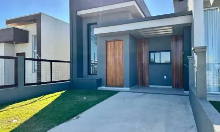 Casa com 3 quartos à venda na Rua Miraguaia, 576, Jardim Beira Mar, Capão da Canoa por R$ 560.000