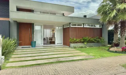 Casa em condomínio fechado com 4 quartos à venda na Rua Rio Divisa, 1332, Centro, Xangri-Lá por R$ 1.990.000