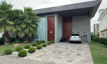 Casa em condomínio fechado com 4 quartos à venda na Rua Onório Germano, 2009, Zona Nova, Capão da Canoa por R$ 1.990.000