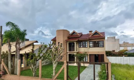 Casa com 4 quartos à venda na Rua Rio Ibiratuipã, 01, Centro, Xangri-Lá por R$ 1.090.000