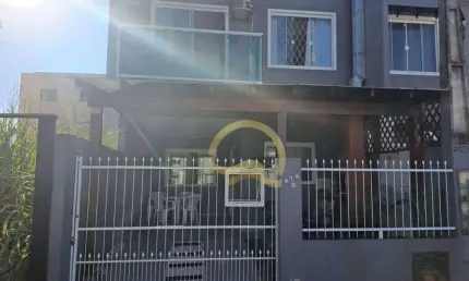 Sobrado com 3 dormitórios para alugar, 85 m² por R$ 3.320,12/ano - Itacolomi - Balneário Piçarras/SC