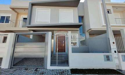 Sobrado de 3 dormitórios com suíte e closet no bairro NSG em Canoas!