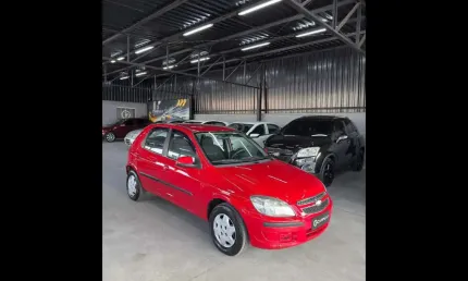 Chevrolet celta spirit/ lt 1.0 mpfi 8v flexp. 5p  - vermelha - 2013/2014